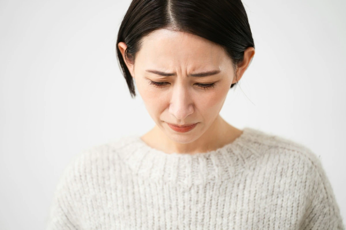 女性　謝罪