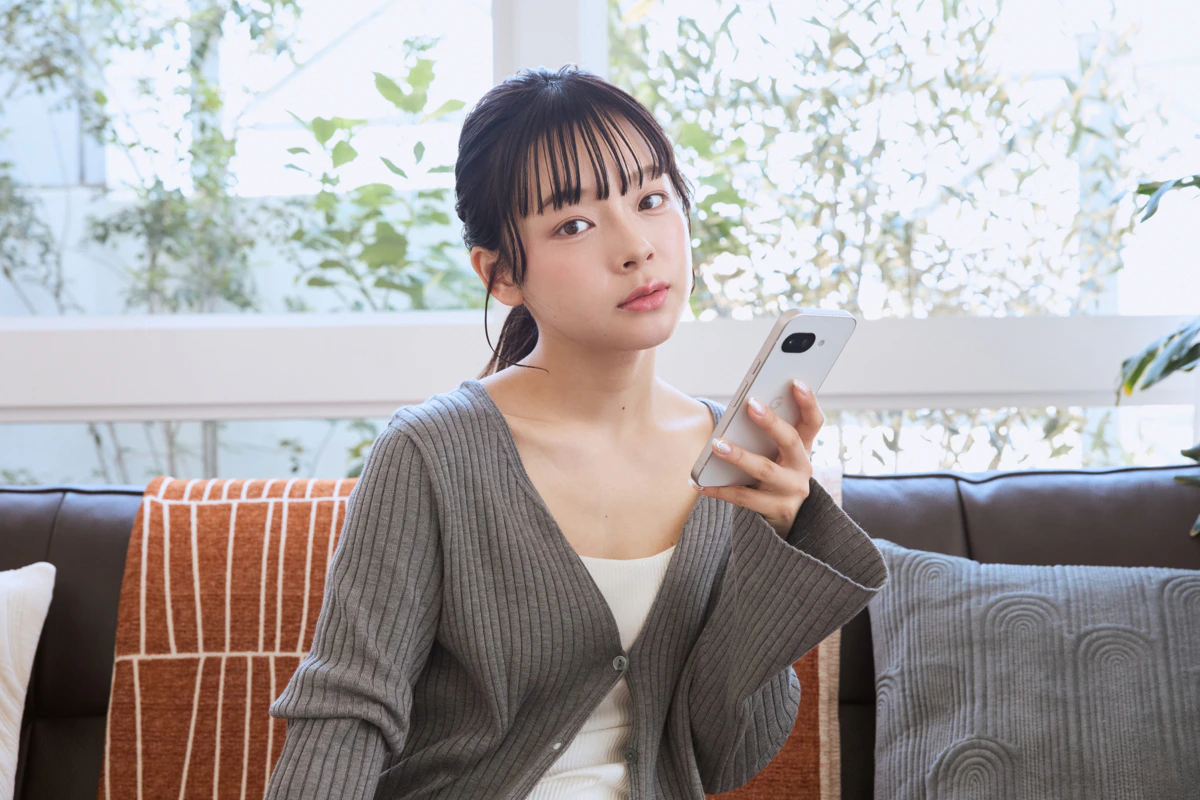 スマホ　悩む　女性